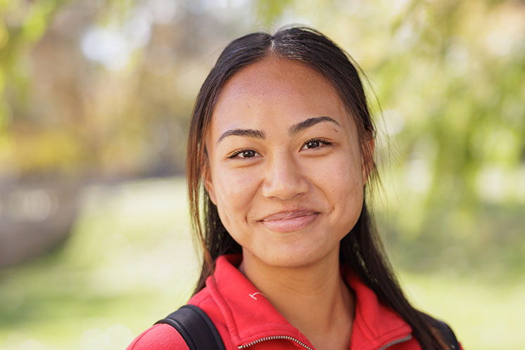 A smiling student. Links to Gifts by Will