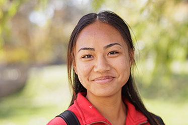 A smiling student. Links to Gifts by Will