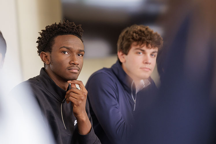 Students paying attention in class. Links to Closely Held Business Stock